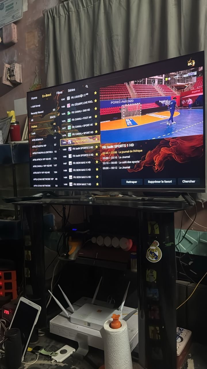 RobotIPTV customer watching French beIN Sports handball coverage in a home workshop