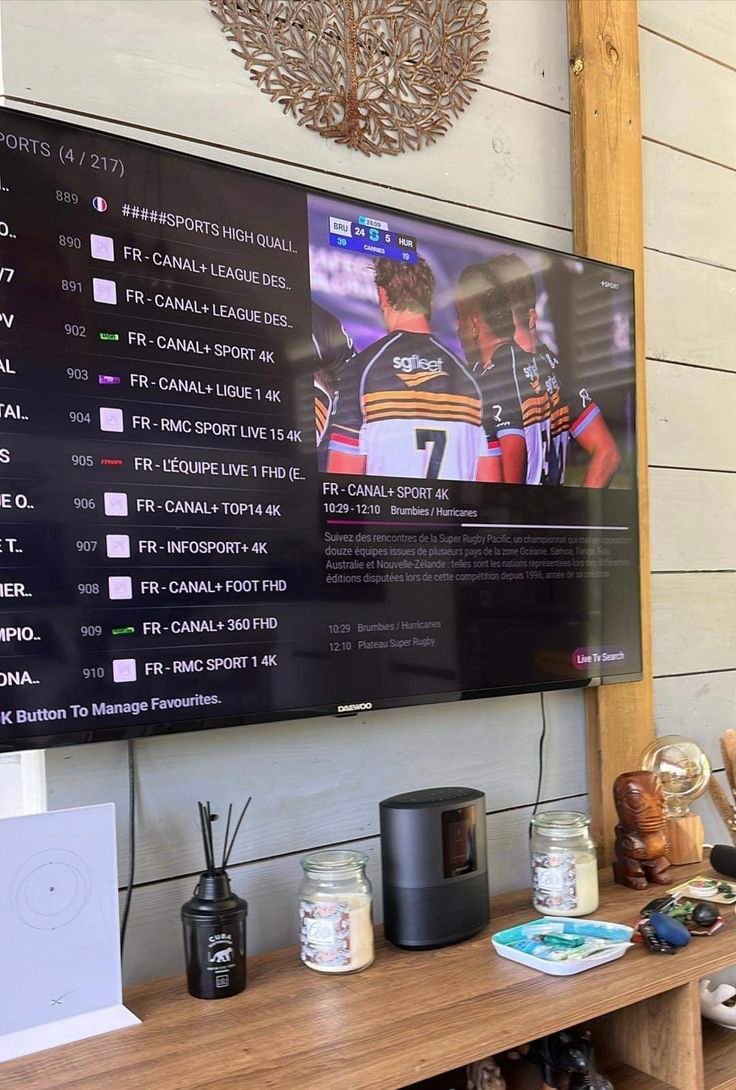 RobotIPTV customer watching French rugby coverage on a Daewoo TV outdoors