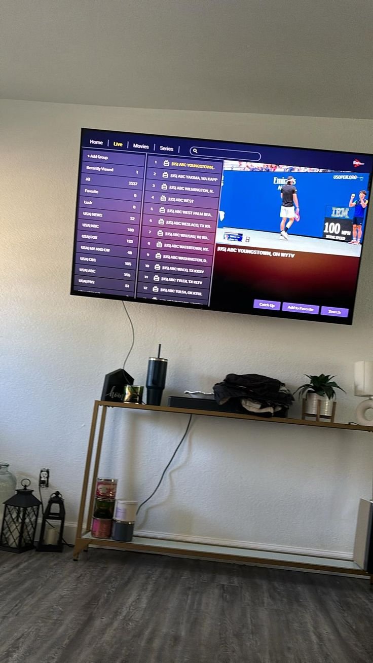 RobotIPTV customer watching US Open tennis on a wall-mounted TV